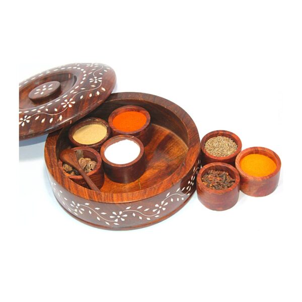 General Utility Wooden Spice / Dry-fruits Round Box / Masala Dabba with 2 cm Thick Lid & Spoon and 7 Inner Bowls of 5.5 cm Dia. x 5mm Thick,Main Box Outer Dia : 20.5 cm and Height 7.5 cm. All Constructed From Premium Quality Solid Sheesham Wood Blocks Having Carved Floral Engravings
